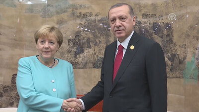 Cumhurbaşkanı Erdoğan, Merkel ile bir araya geldi