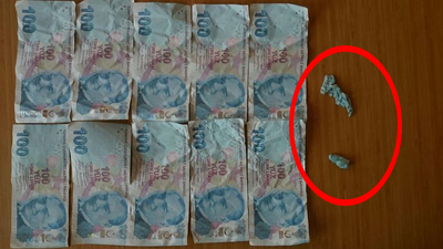 Polisi görünce kağıt parayı yutmaya çalıştı!