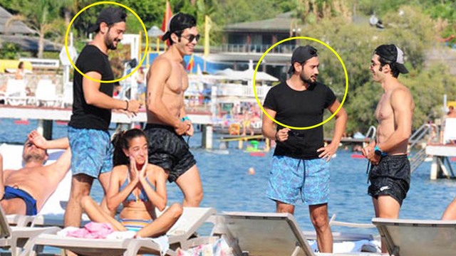 40 derecede siyah tişörtle plajda!