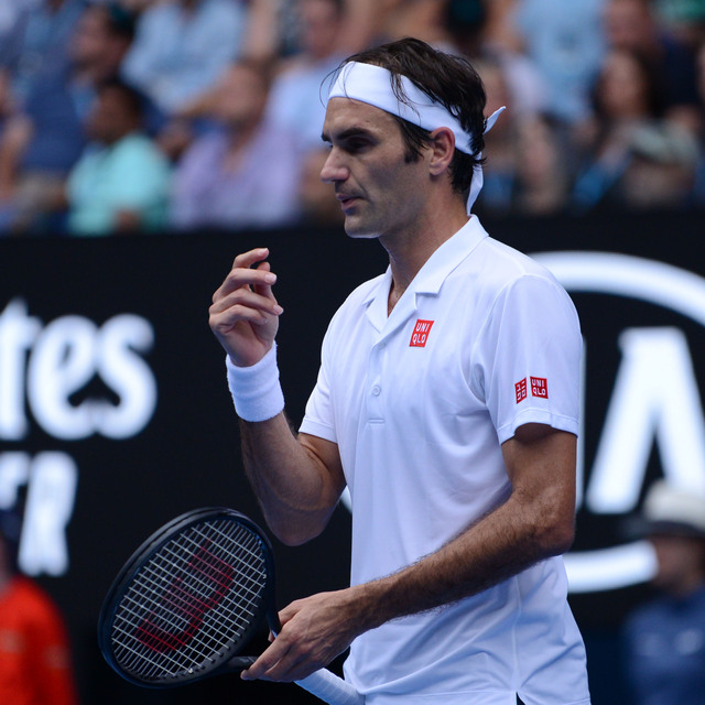 Federer ve Wozniacki set vermeden tur atladı