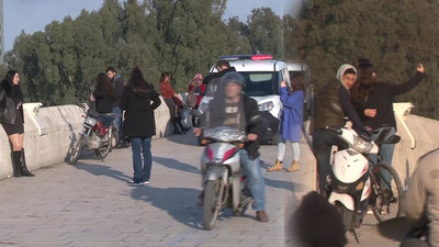 Okul çantasını bırakıp nehre atladı, onlar fotoğraf çekti!