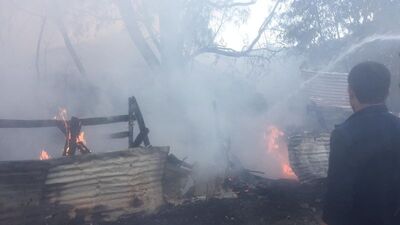 Çöp konteynerinden sıçrayan alevler evin çatısını yaktı