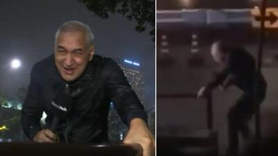 Tayfunun ortasında haber sundu