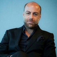 Erol Özmandıracı kimdir?