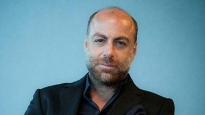 Erol Özmandıracı kimdir?