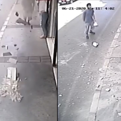 Üzerine beton düştü! Saniyelerle kurtuldu!