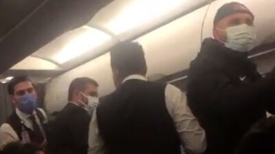 Uçakta maske arbedesi!