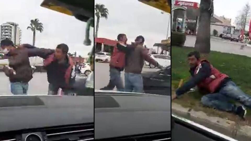 Trafik ışığında cam silme kavgası