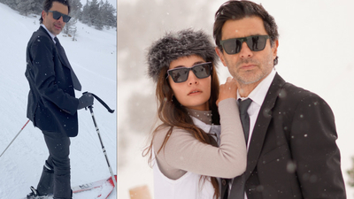 Takım elbisesiyle kayak pistinde