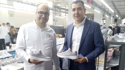 Nike'ı Türkiye'de üretime davet etti