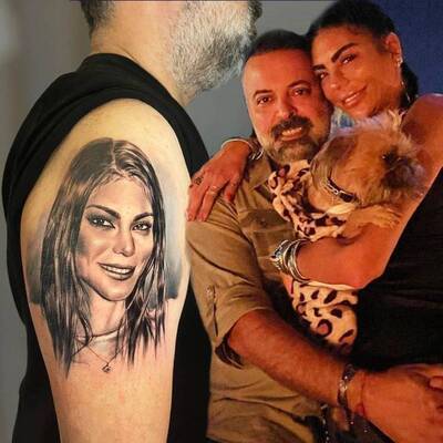 Eşini koluna kazıttı!