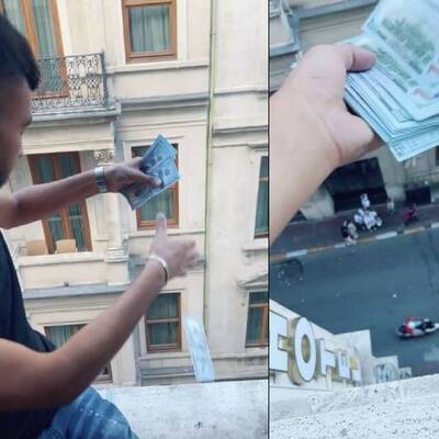 Otel penceresinden para saçtı!