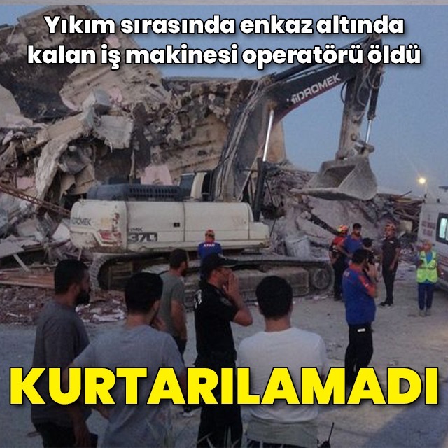 Hasarlı bina iş makinasının üstüne devrildi