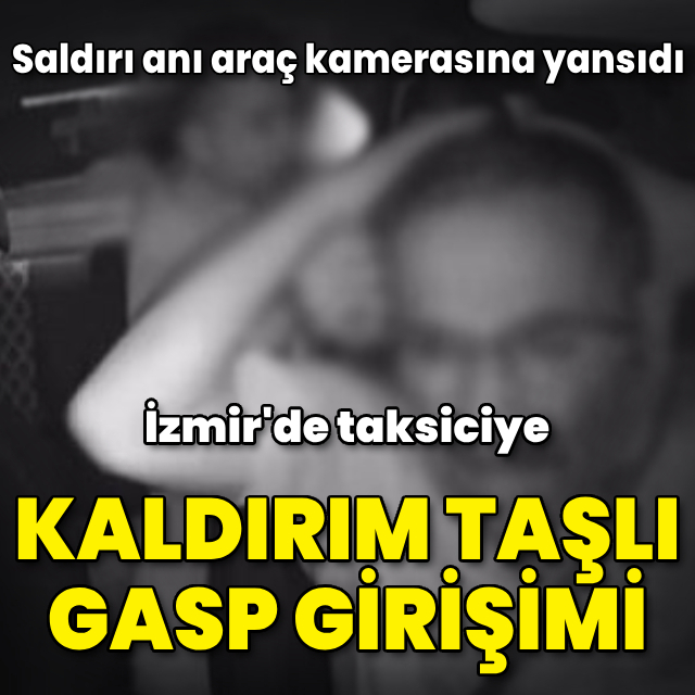 Taksiciye kaldırım taşı ile gasp girişimi kamerada