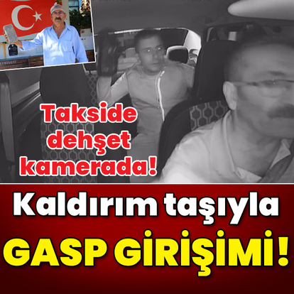 Takside dehşet kamerada! Kaldırım taşıyla gasp girişimi!