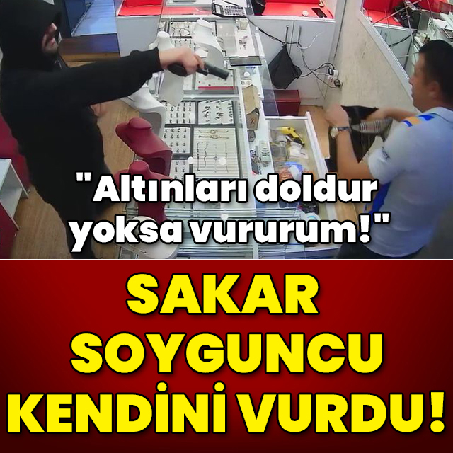 "Altınları doldur yoksa vururum!" Sakar soyguncu kendini vurdu!