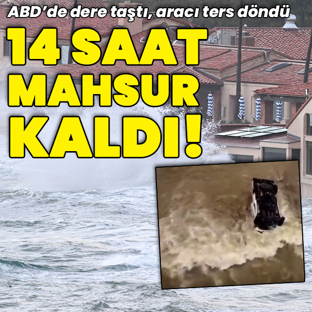 Dere taştı, aracının üstünde mahsur kaldı!