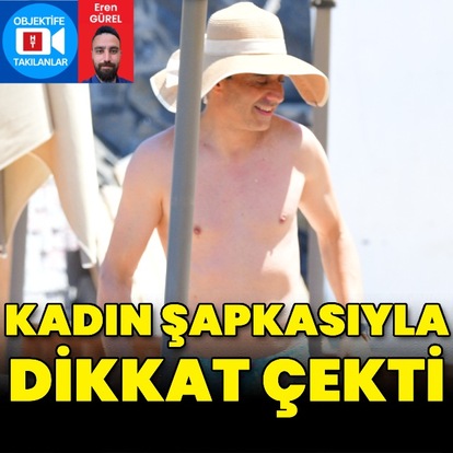 Kadın şapkasıyla dikkat çekti