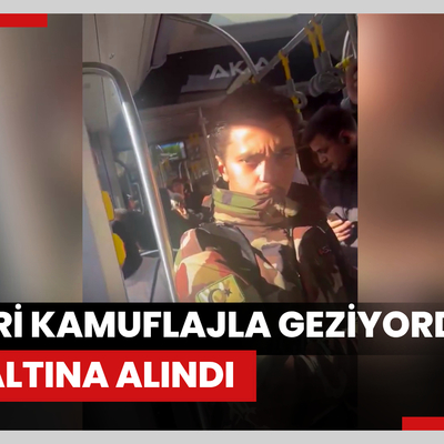 Askeri kamuflajla geziyordu: Gözaltına alındı, sınır dışı edilecek