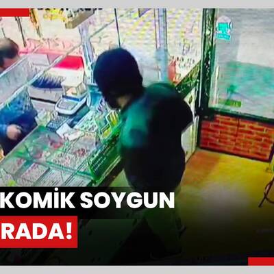 Trajikomik soygun girişimi kamerada: Oyuncak silahla soymaya kalktığı kuyumcudan dayak yedi