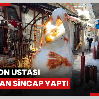 Baston ustası kardan sincap yaptı