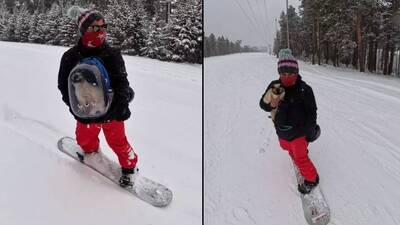 Kedisiyle snowboard yaptı