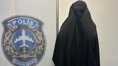 Kadın kılığında yakalandı