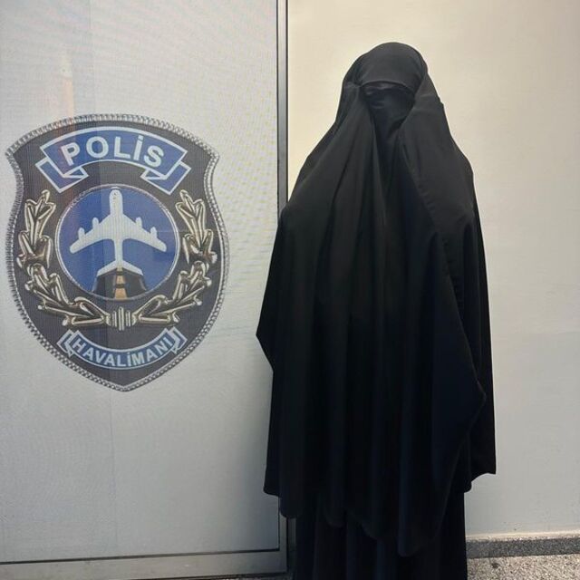 Kadın kılığında yakalandı