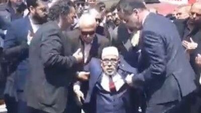 Türkeş'i anma programında dua eden imam bayıldı