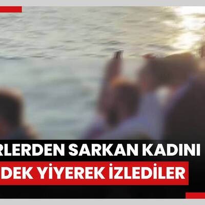 Haliç Metro köprüsünün altındaki demirlerden sarkan kadını çekirdek yiyerek izlediler