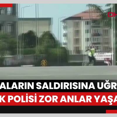 Kargaların saldırısına uğrayan trafik polisi zor anlar yaşadı