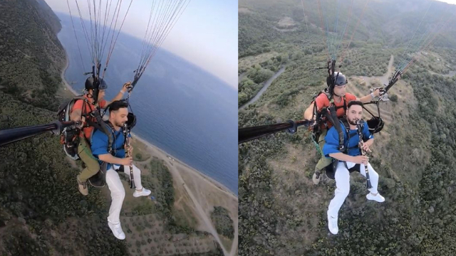 Yamaç paraşütüyle uçarken klarnet çaldı