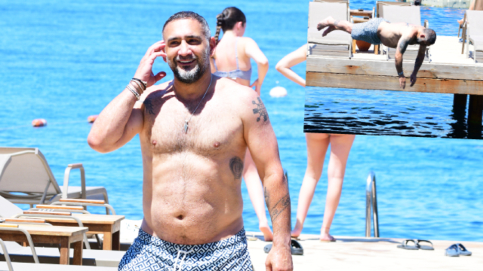 Denizin keyfini çıkardı