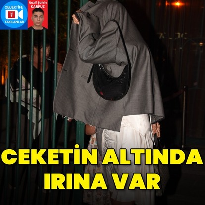 Ceketin altında Irina var