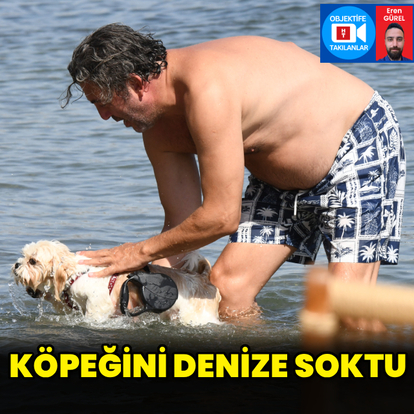 Köpeğini denize soktu