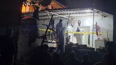 Oğlunu öldürüp eşini ağır yaraladı