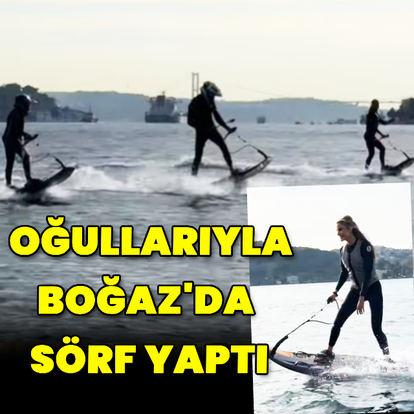 Oğullarıyla Boğaz'da sörf yaptı