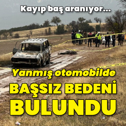 Yanmış otomobilde başsız bedeni bulundu