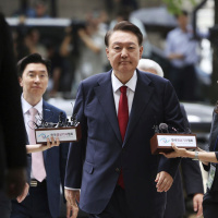 Güney Kore'nin devrik liderine hapis cezası