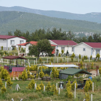 Hobi bahçesinde bağ evi-villa ayrımı