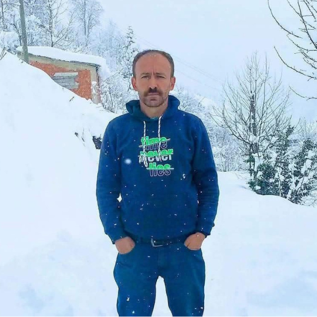 Fındık bahçesine yuvarlanan araçta can verdi