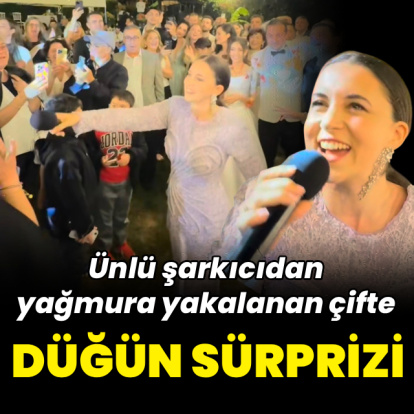 Yağmura yakalanan çifte düğün sürprizi