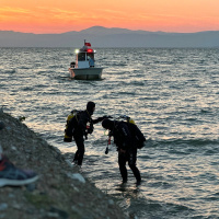 Oğlunu kurtarmak isterken canından oldu