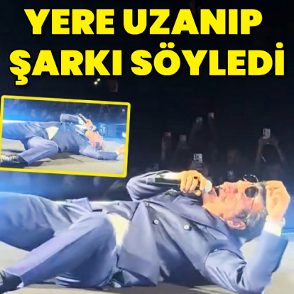 Yere uzanıp şarkı söyledi