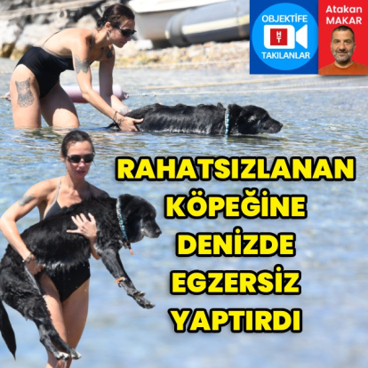 Köpeğine denizde egzersiz yaptırdı