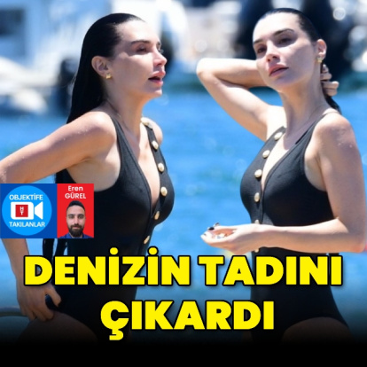 Denizin keyfini çıkardı