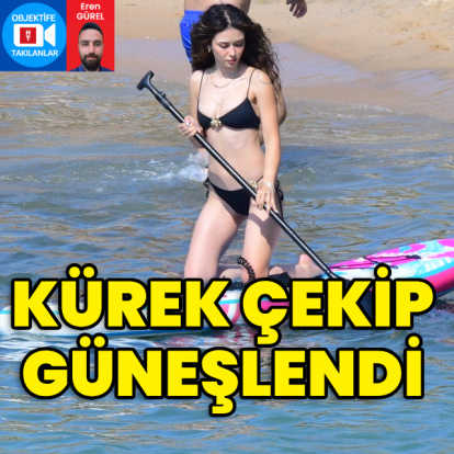 Kürek çekip güneşlendi