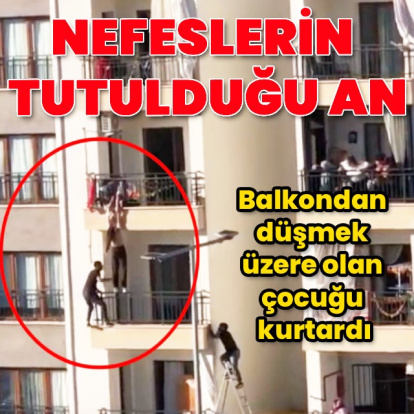 Balkondan düşmek üzere olan çocuğu kurtardı