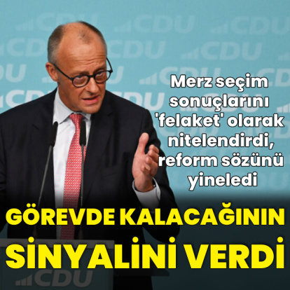Merz görevde kalacağının mesajını verdi