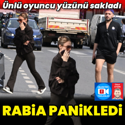 Panikleyerek yüzünü gizledi